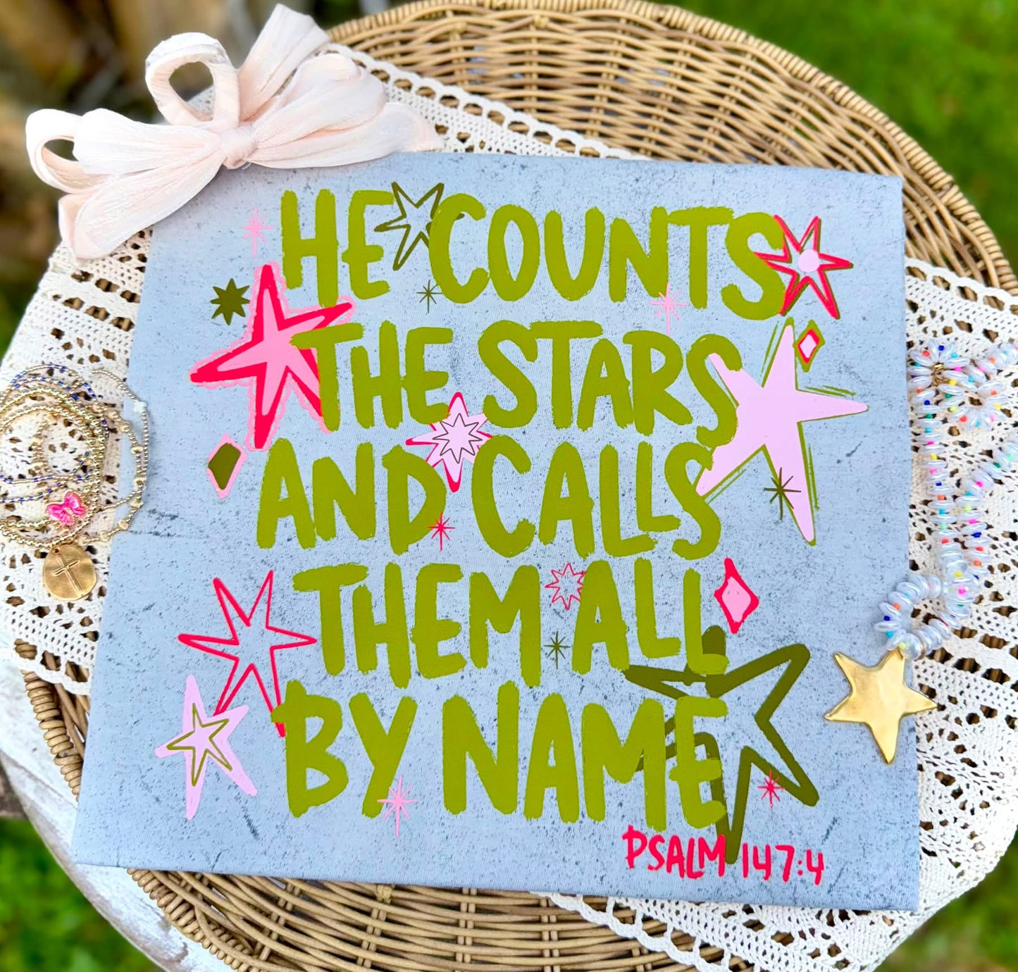 HE COUNTS THE STARS AND CALLS THEM ALL BY NAME